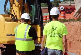 McCullough Landscaping team providing grading service for erosion control