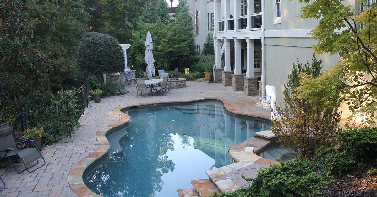 Stone Pavers for pool deck and outdoor kitchen in Cumming Ga